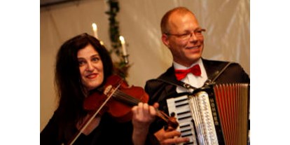 Hochzeitsmusik - geeignet für: kirchliche Trauung - Oelde - Olaf Wittelmann mit Geigerin - Olaf Wittelmann Partyband